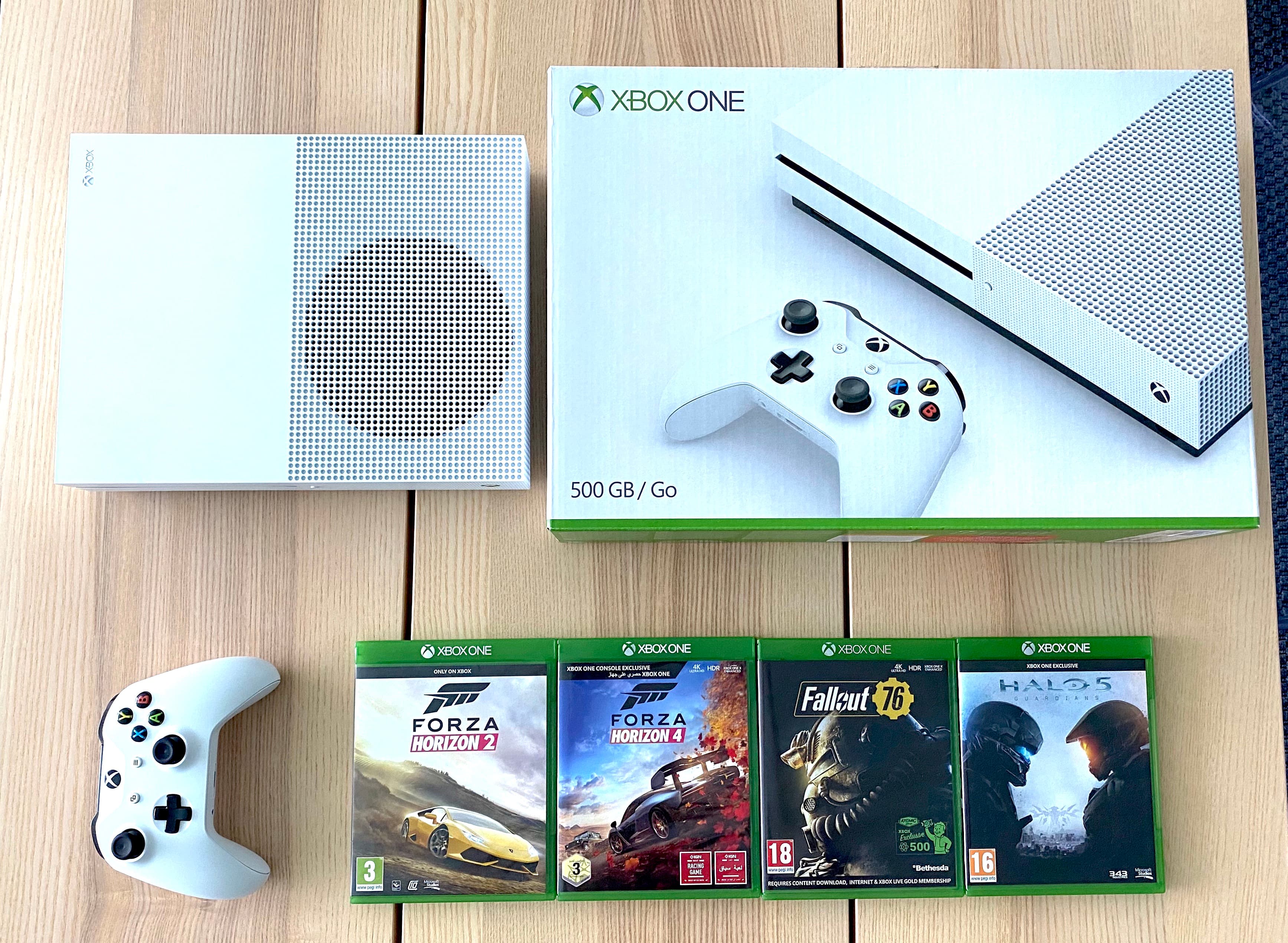 Xbox One 500GB + 4 Games - For Sale in Bahrain