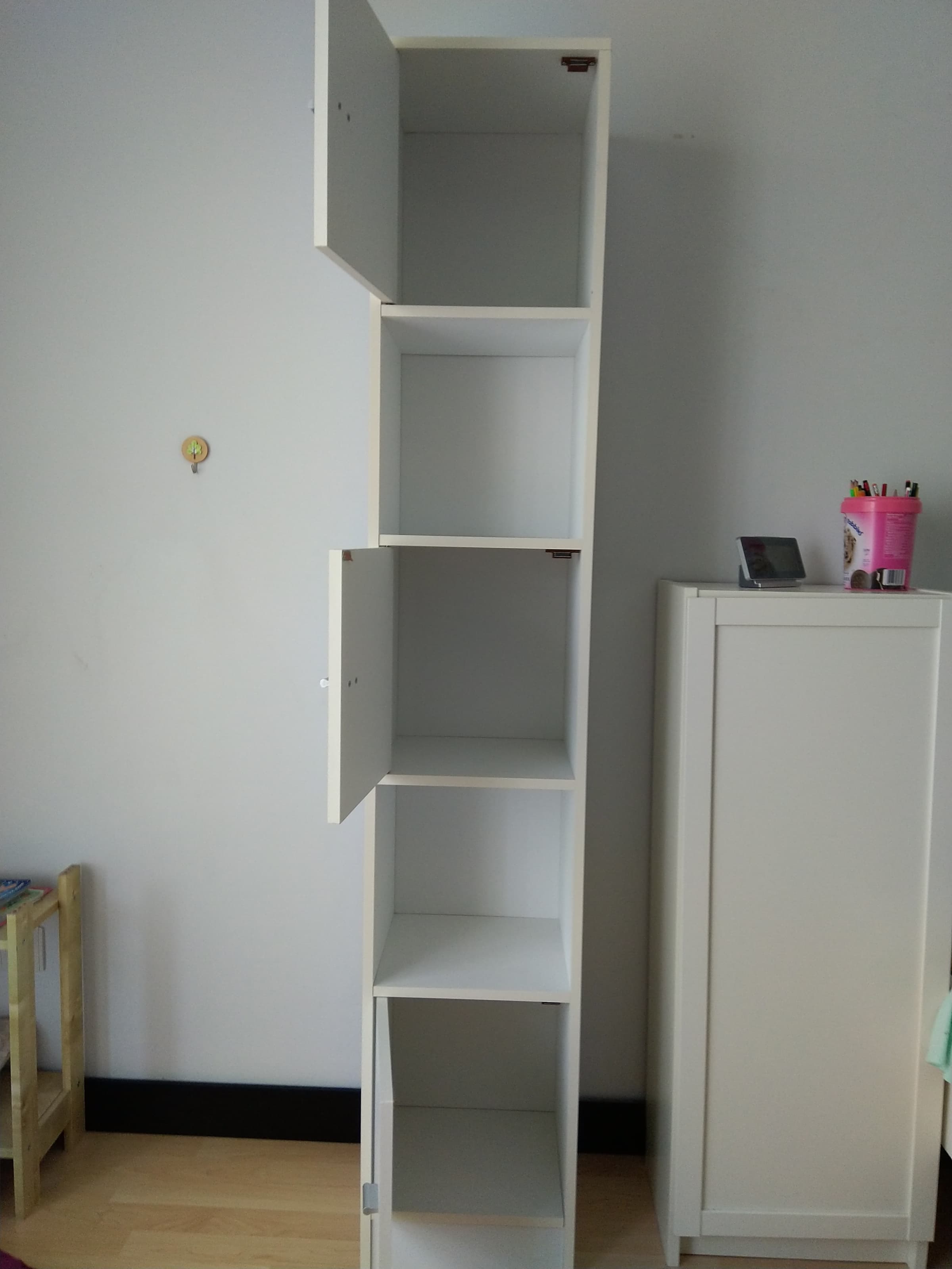 Tall cabinet with shelves image 2
